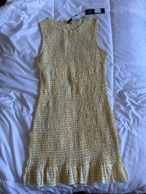 Yellow Gingham Smocked Mini Dress with Ruffle Hem